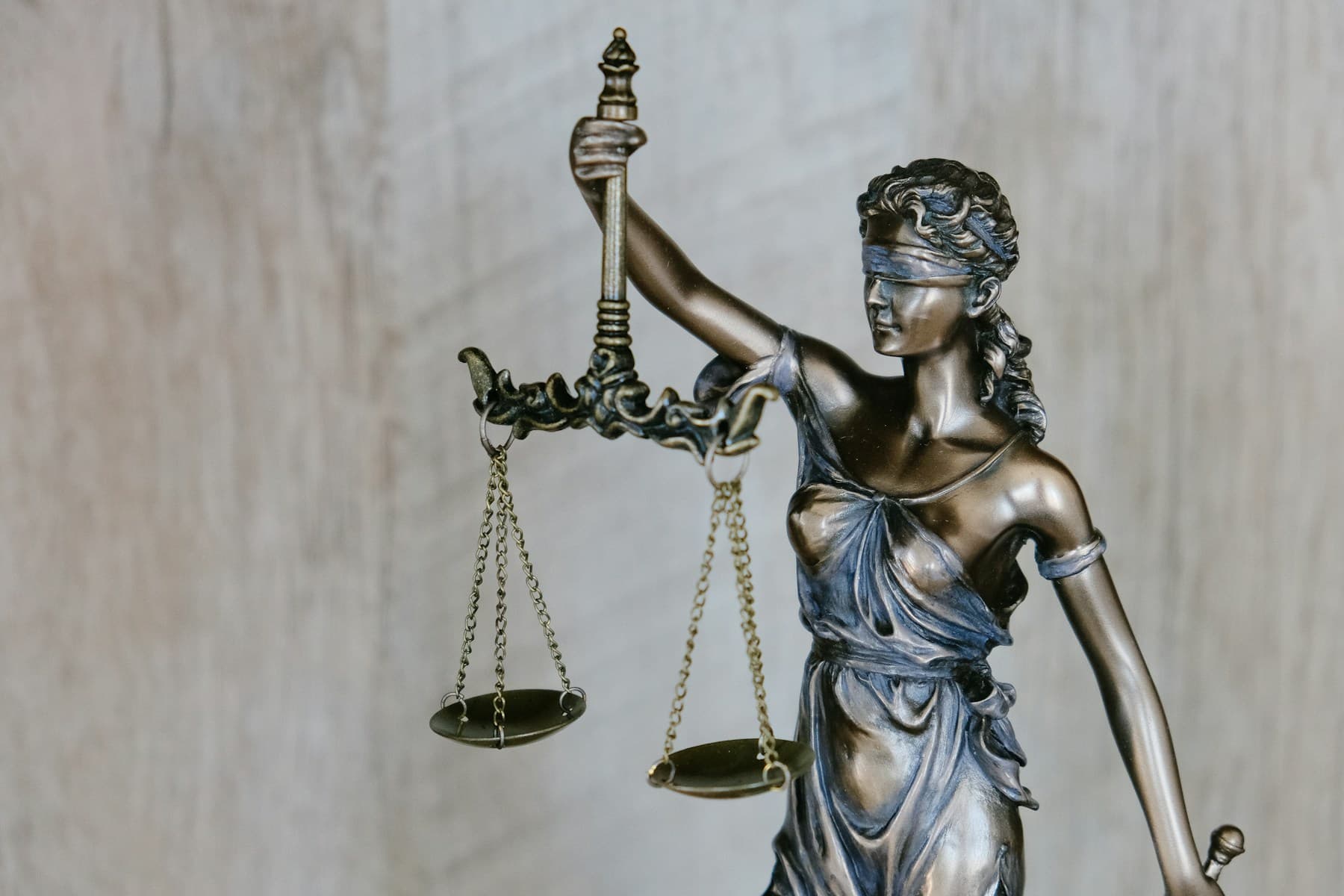Lady Justice statue representing legal practice operations